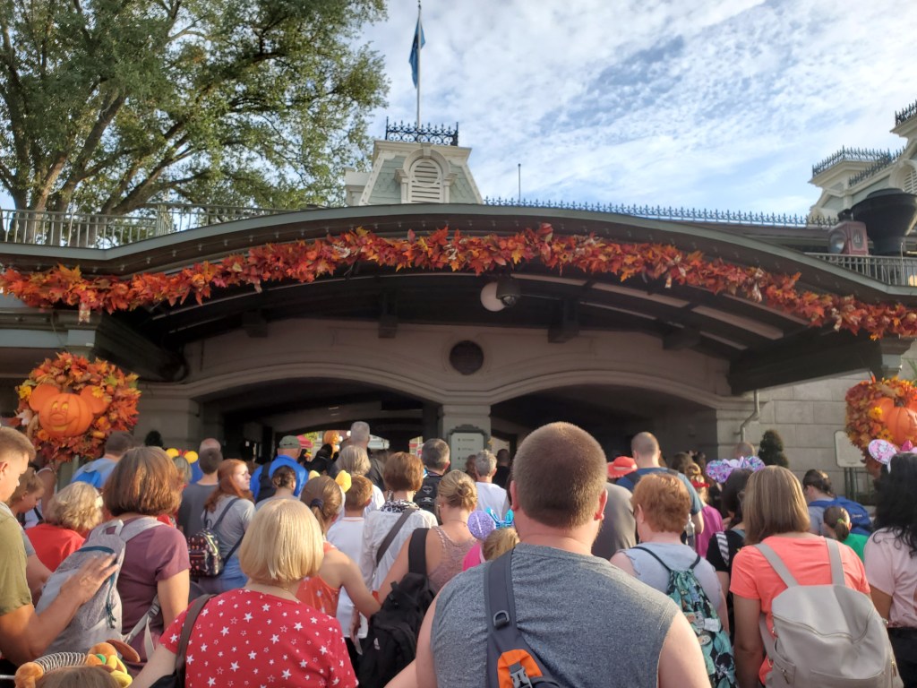 People packed in waiting to enter main street of Magic Kingdom