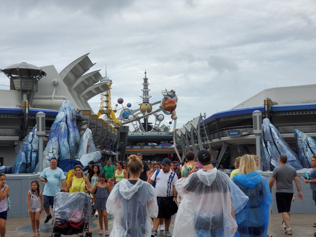 walking into tomorrowland at Disney's Magic Kingdom theme park in Orlando Florida. 