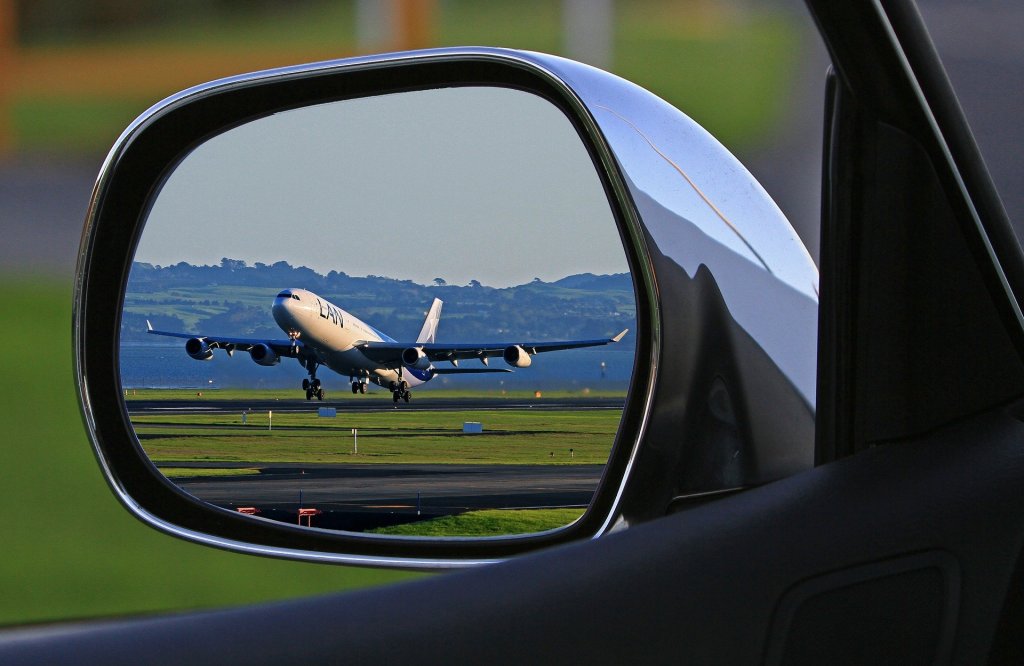 Plane in side view mirror of car, travel, road trip, flying, 