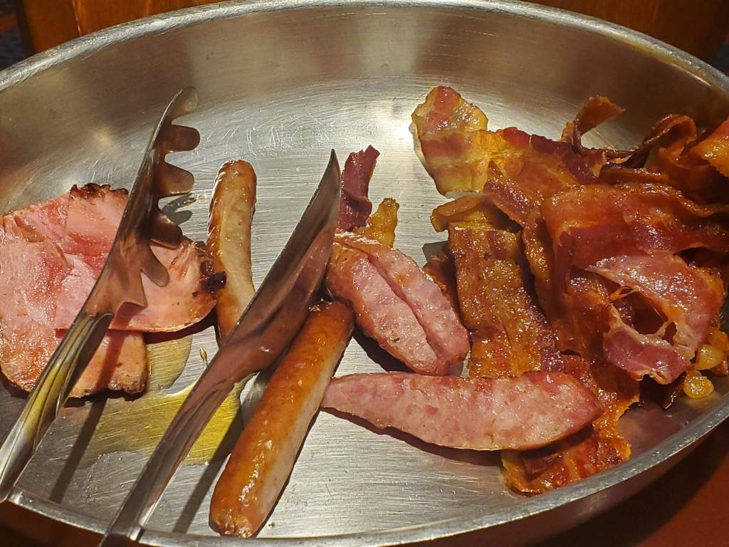 Breakfast meats including ham, sausage and bacon